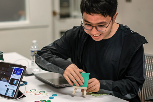 A woman working in a game design lab